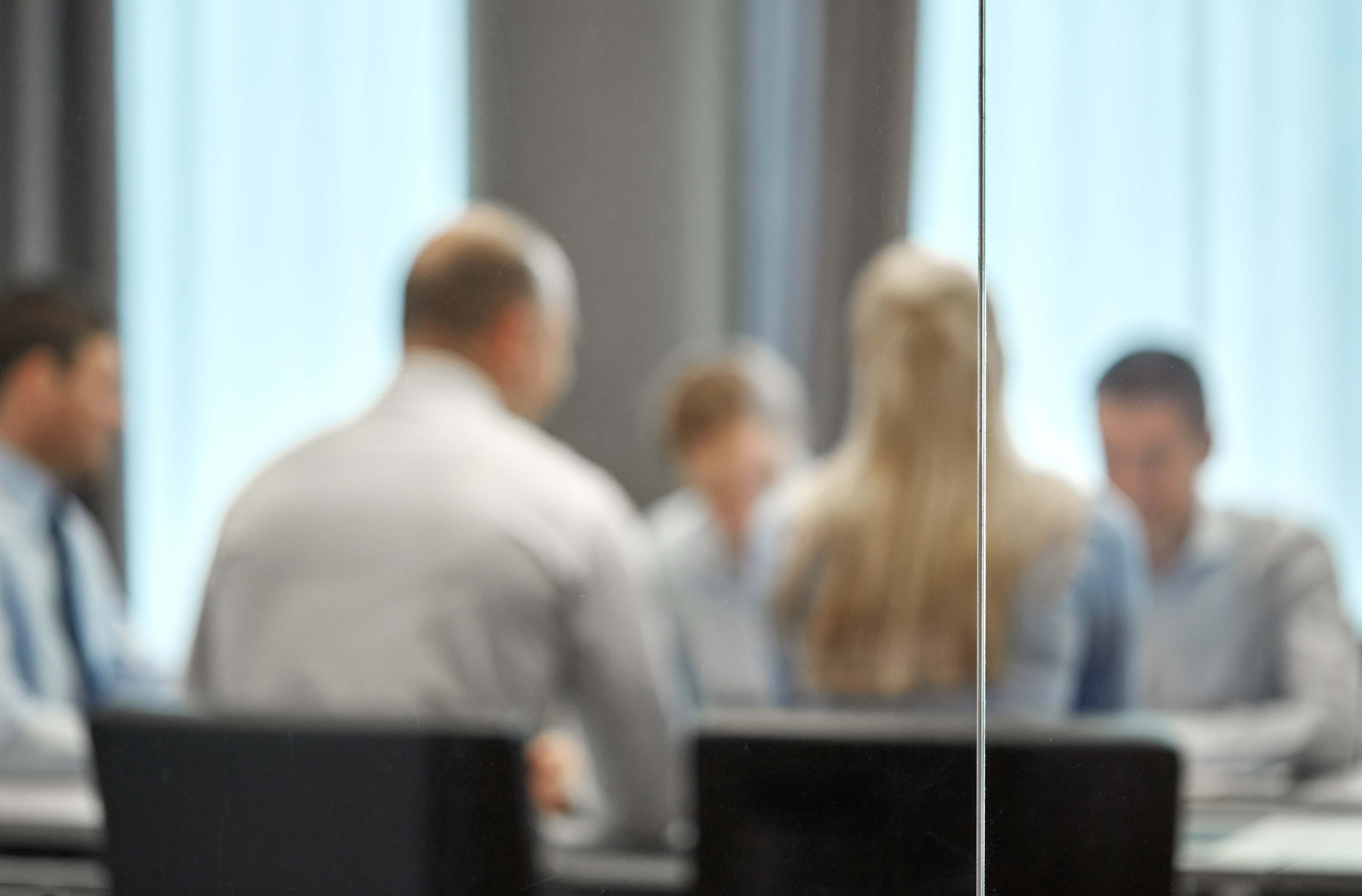 43202826 Business Team Meeting At Office Behind Glass Wall Besk