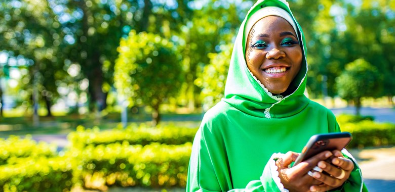 53473749 Latin Hispanic Arab Woman In Green Muslim Dress With
