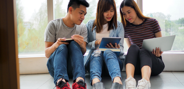 Mp40692696 Student Groups Are Viewing Information In Books Tablets